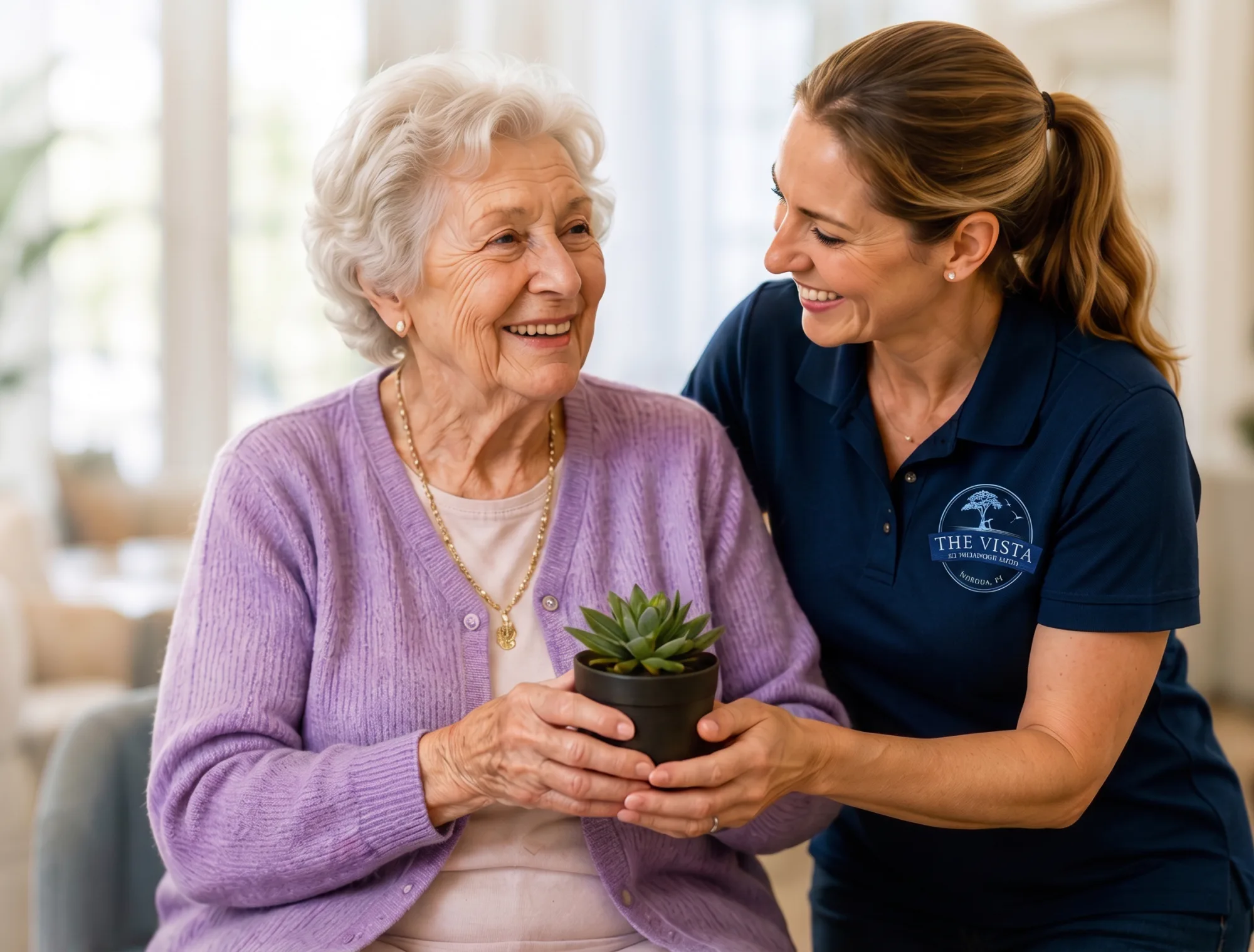 Caregiver helping a memory care resident